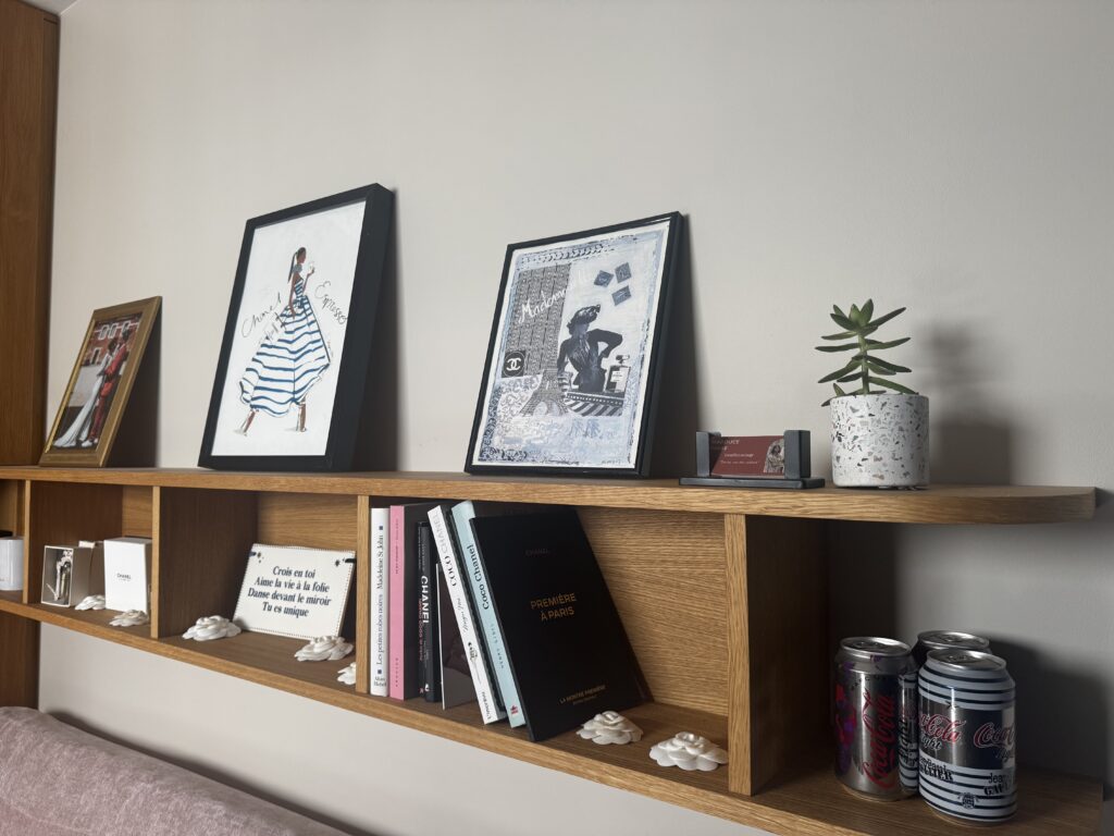 Soft focused elegant interior of a boutique image consultancy showroom in Lille with warm lighting and feminine decor